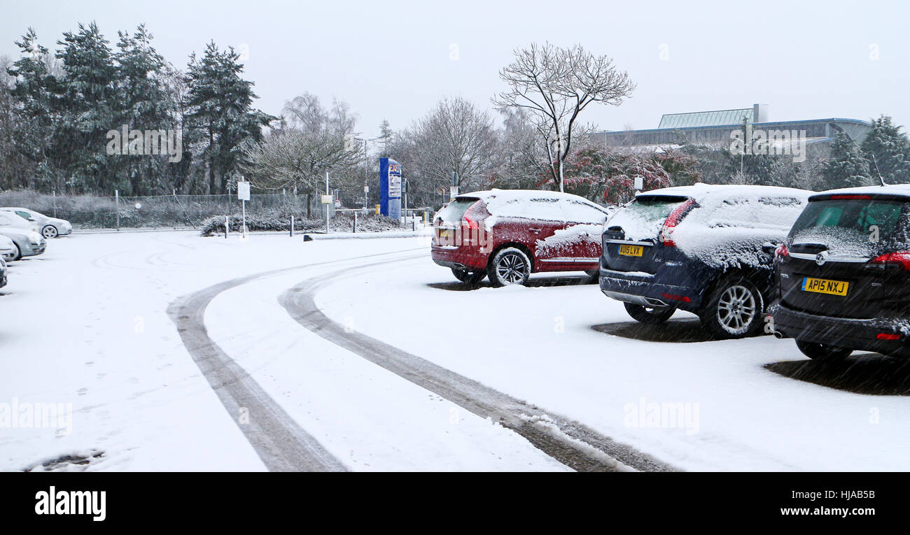 A view of the car park at Norwich International Airport after a period of winter snowfall in Norwich, Norfolk, United Kingdom. Stock Photo