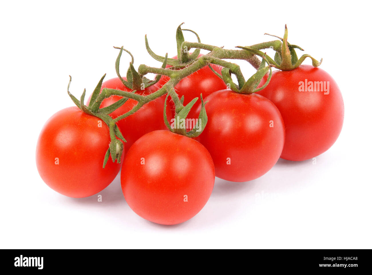 Cherry tomatoes isolated on white Stock Photo - Alamy