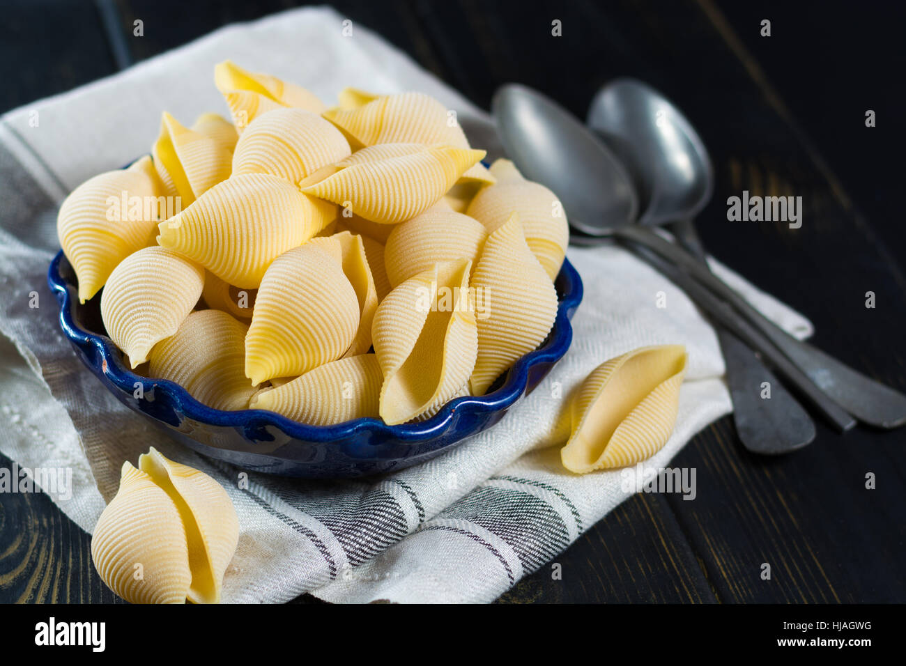 Big Italian pasta shells for stuffing, uncooked Stock Photo Alamy