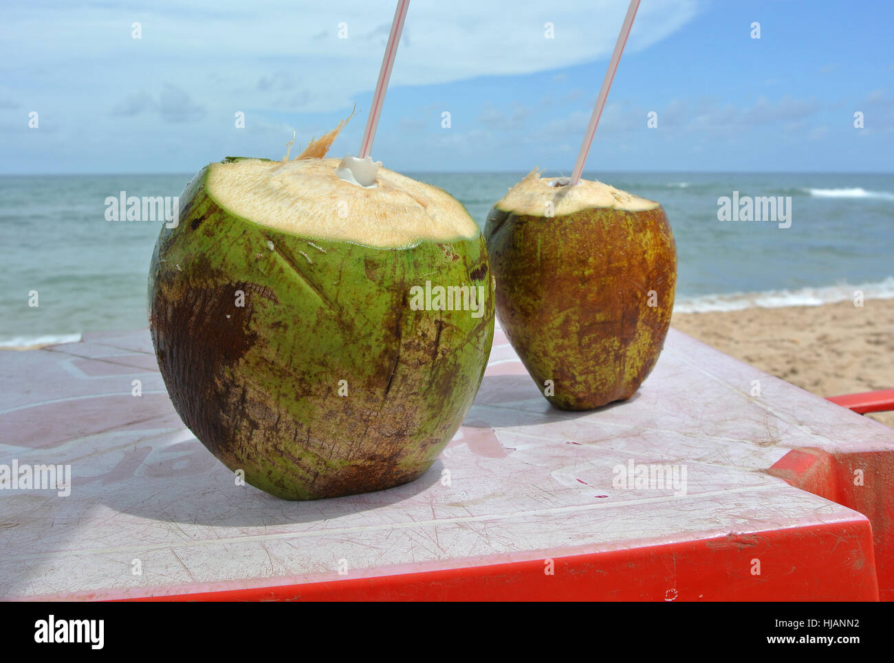 fresh coconut on the beach Stock Photo Alamy