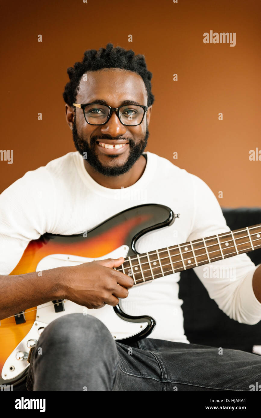 Artist producing music in his home sound studio Stock Photo - Alamy