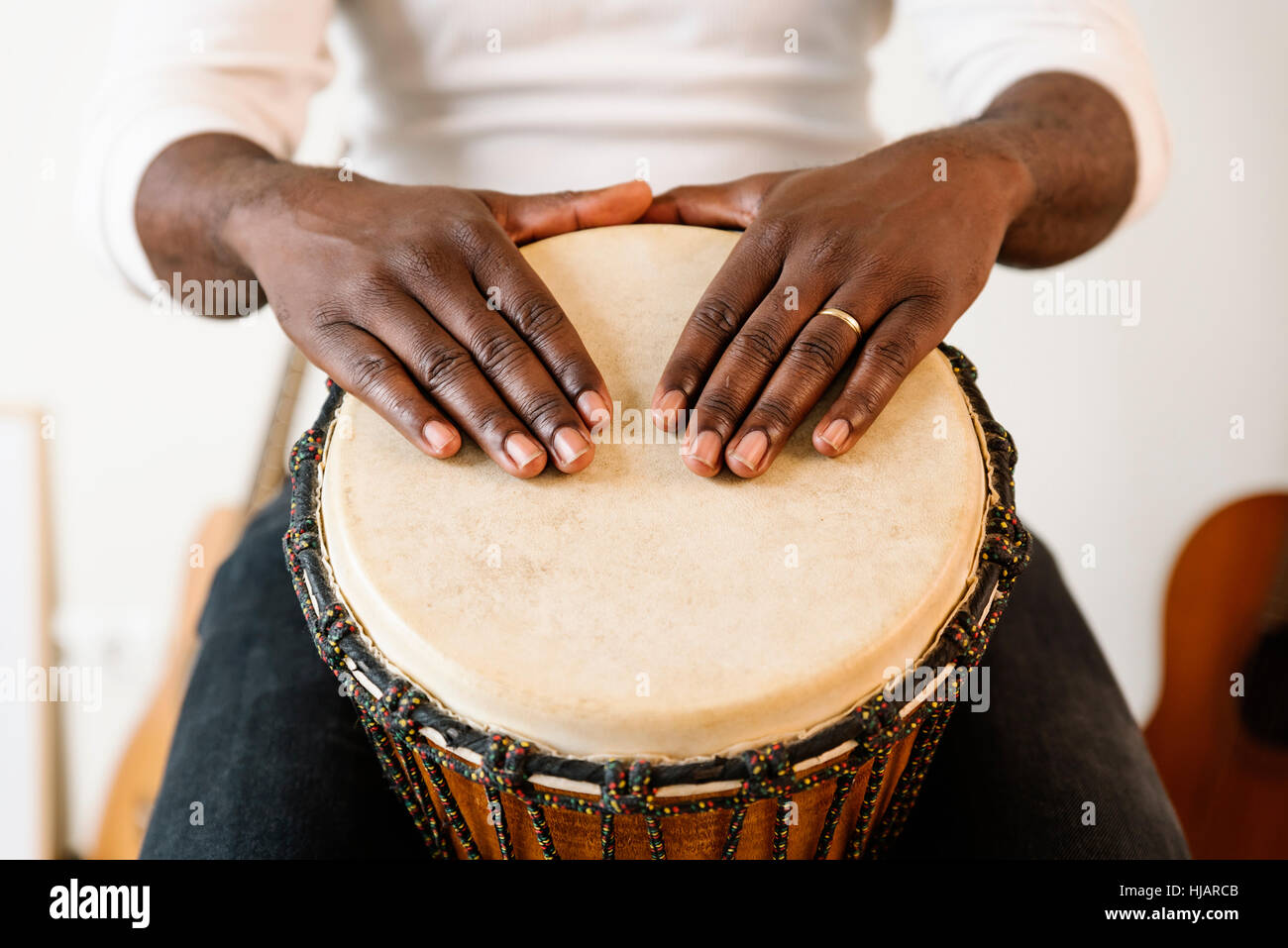 Musician Playing Drum with his hands Stock Photo Alamy