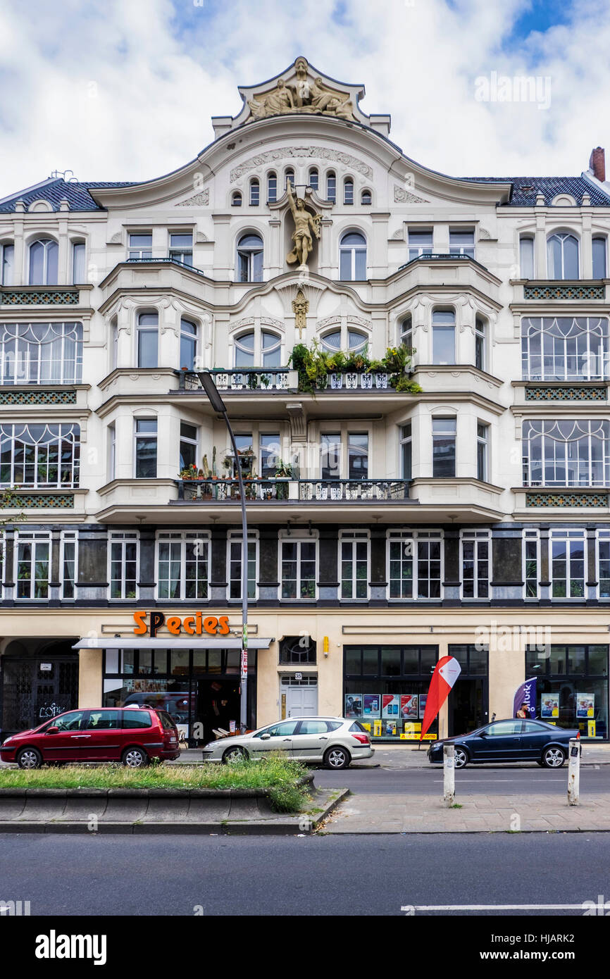Berlin, Gesundbrunnen. Gabled Art Noveau Style building (1903) by Carl Galuschki. Listed historic building decorated with statues of Greek gods. Stock Photo