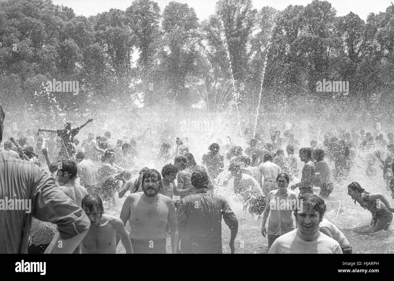 Protesters frolic in a fountain during the anti-war protest in Washington, DC, May 9, 1970. Stock Photo