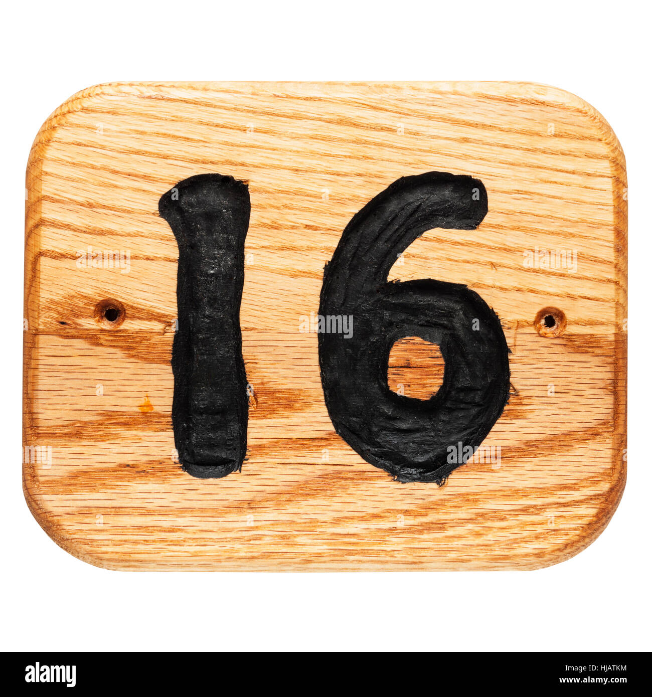 A handmade oak house number sign on a white background Stock Photo