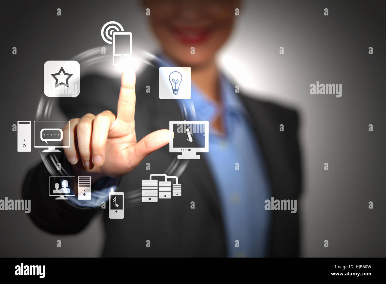 Business person pushing symbols on a touch screen interface Stock Photo ...