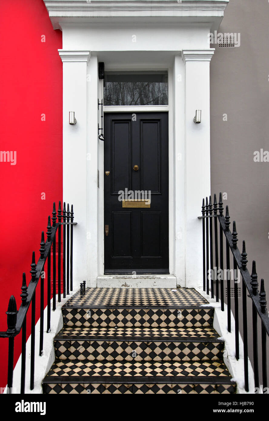 A Row of Brick Buildings with Black Doors on a Street in London Stock Image  - Image of architecture, english: 189002149