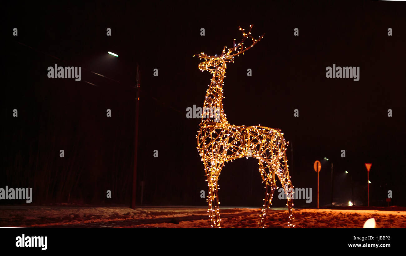 Family of deer bright Christmas illuminations Stock Photo - Alamy