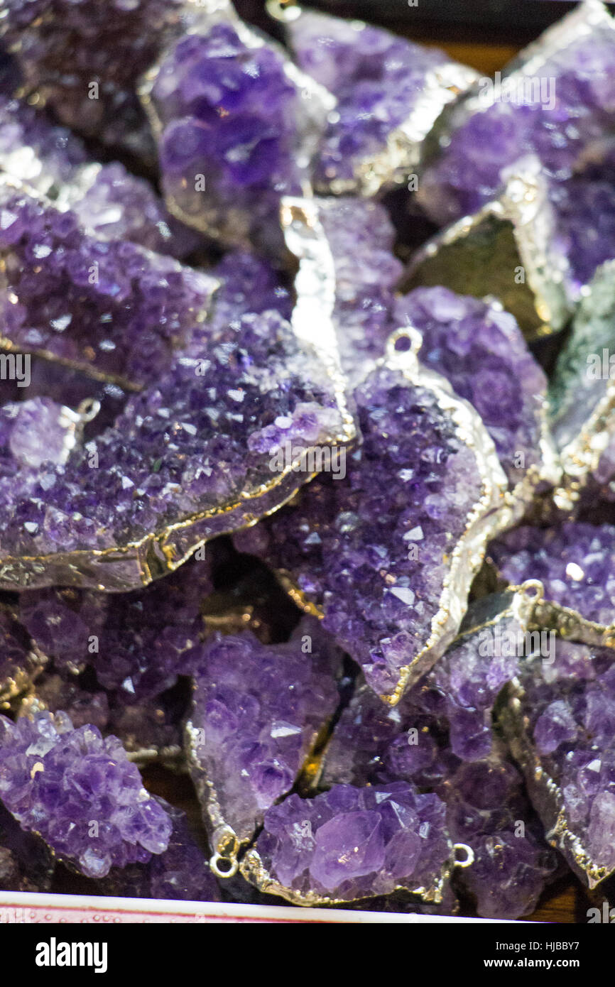 Raw violet amethyst rock with crystal ametist esoteric Stock Photo