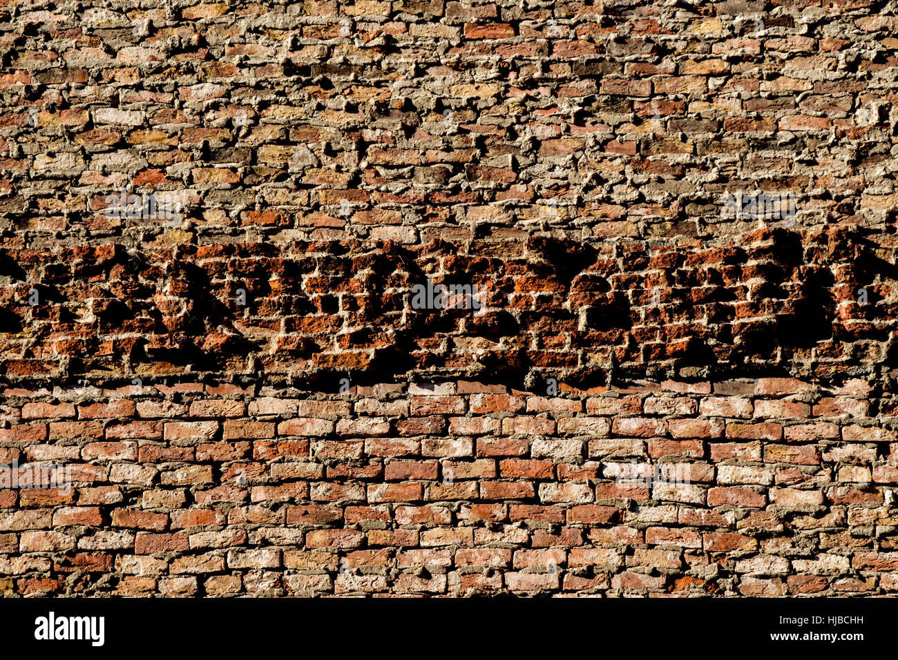 Old grunge brick wall as a background Stock Photo - Alamy