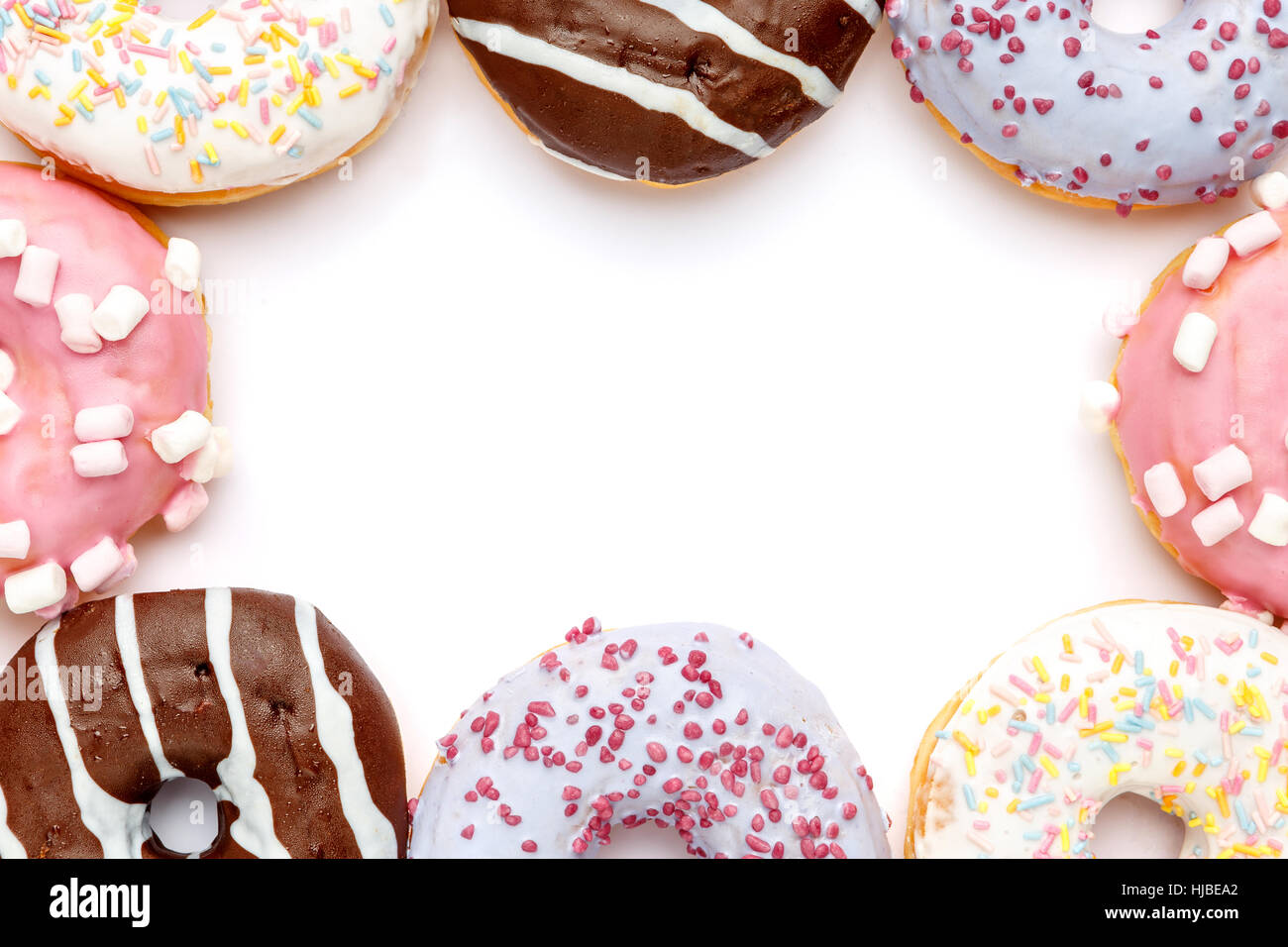 Donuts isolated on white Stock Photo - Alamy