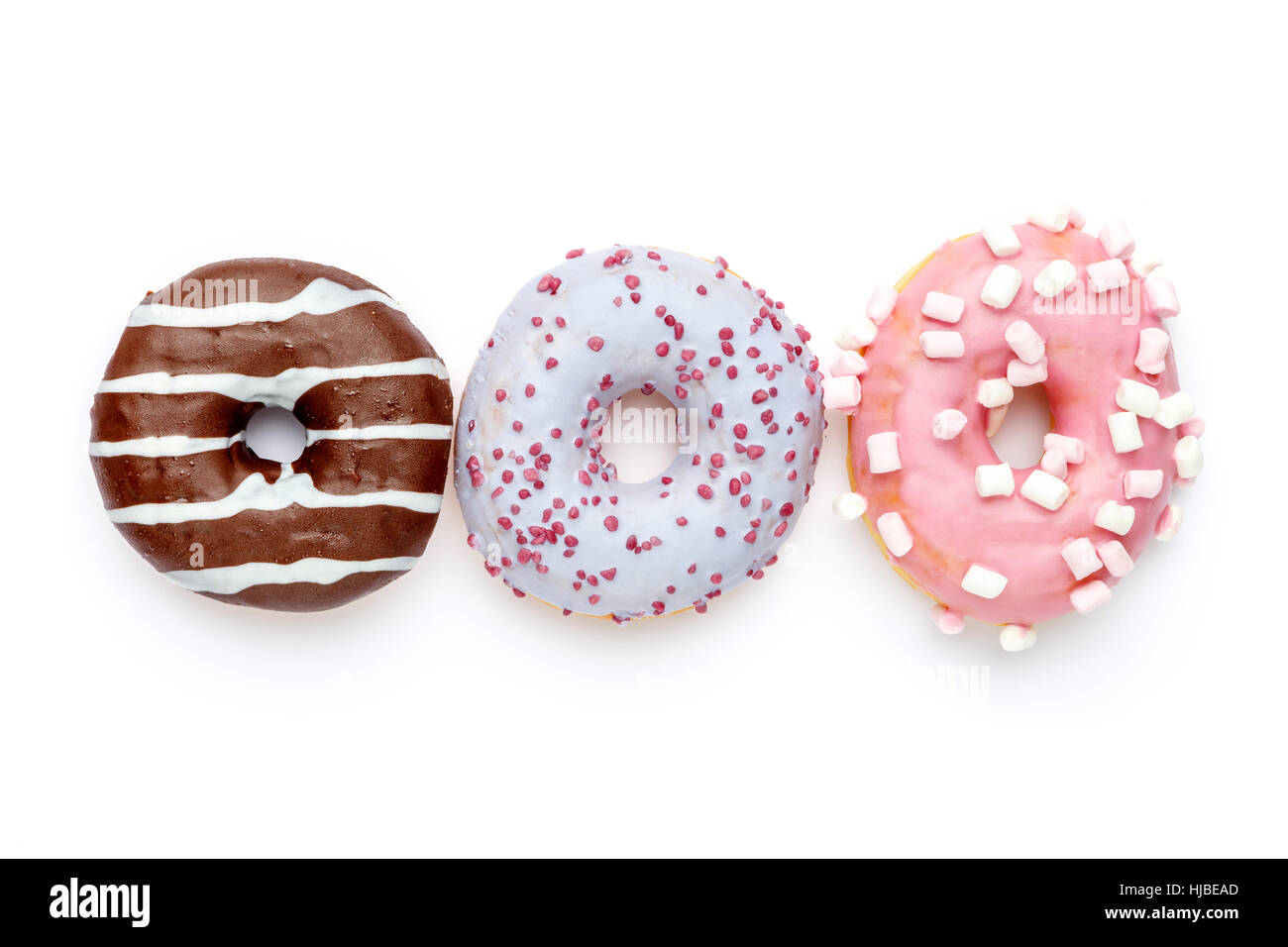 Donuts isolated on white Stock Photo - Alamy