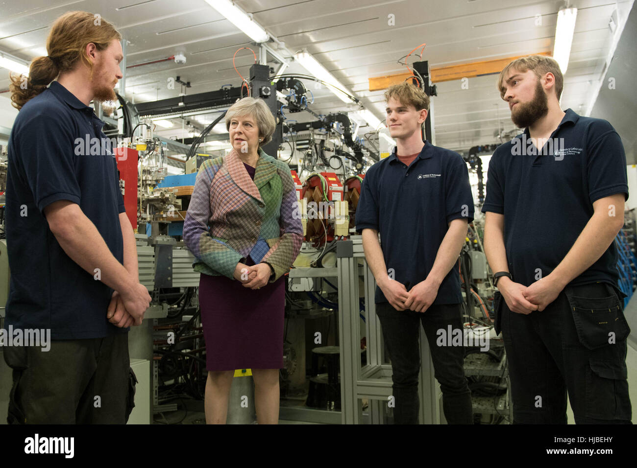 Prime Minister Theresa May meets technicians at Ski-Tech Daresbury in Warrington, Cheshire where she held her first regional cabinet meeting before announced new investment in research and development in industries such as electric vehicles and biotech and quantum technologies in the hope of creating more high skilled and high paid jobs. Stock Photo