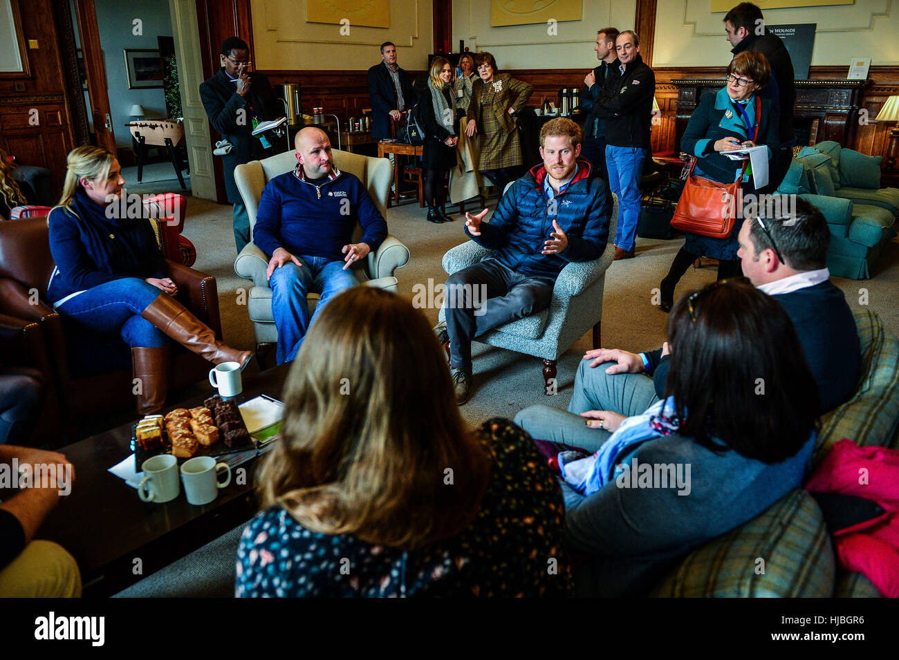 Prince Harry speaks with members of fellowship groups during a visit to a Help For Heroes Recovery Centre at Tedworth House in Tidworth, Wiltshire, where he learnt more about the mental health support military veterans are receiving. Stock Photo