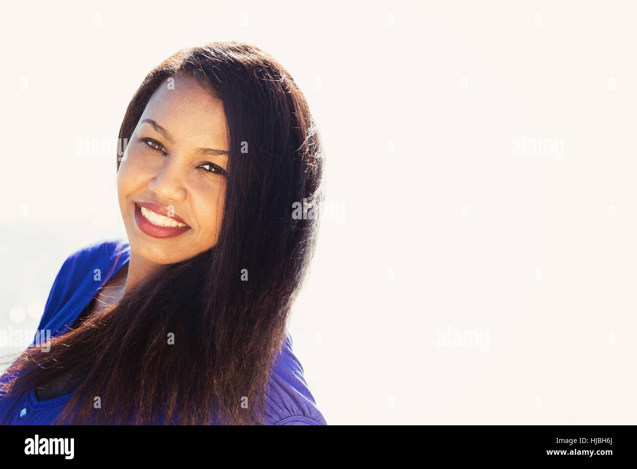 Portrait of a beautiful young girl smiling with copyspace Stock Photo ...
