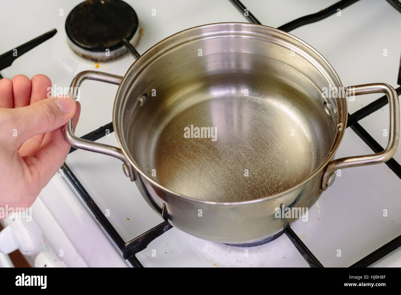 pan of boiling water on the gas stove closeup Stock Photo Alamy
