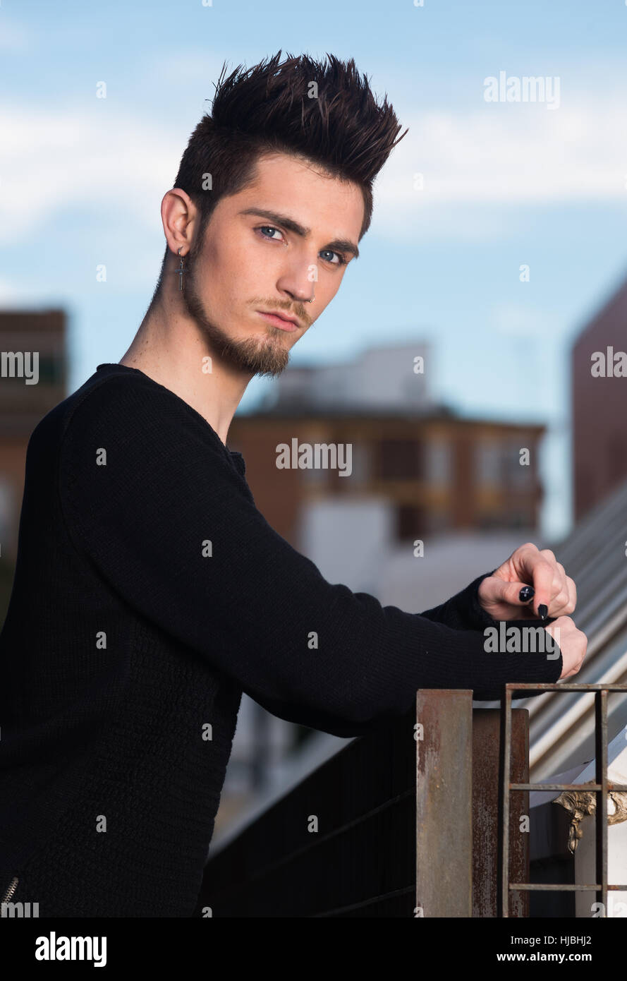 Fashion portrait of handsome young man in the city Stock Photo - Alamy