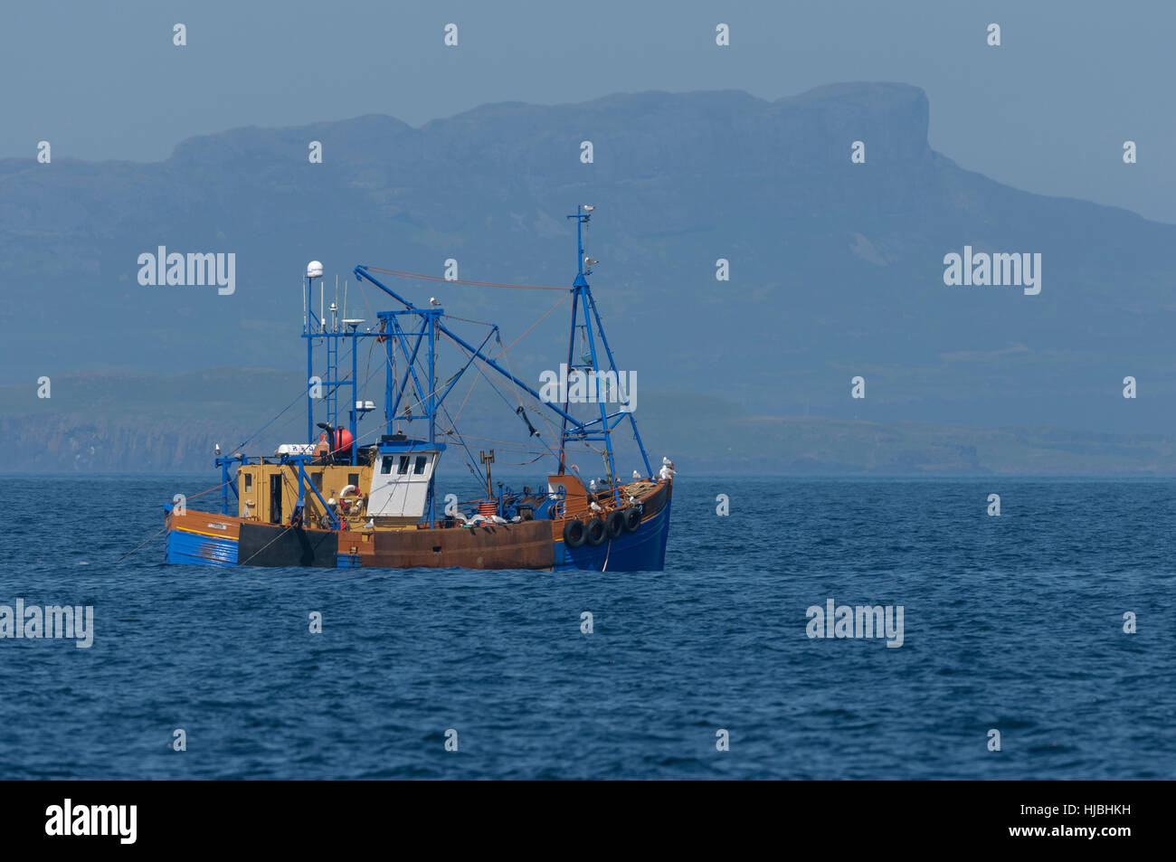 Fishing vessel “Dawn Maid” dredging for scallops by the isle of Eigg. Small Isles, Scotland. Stock Photo