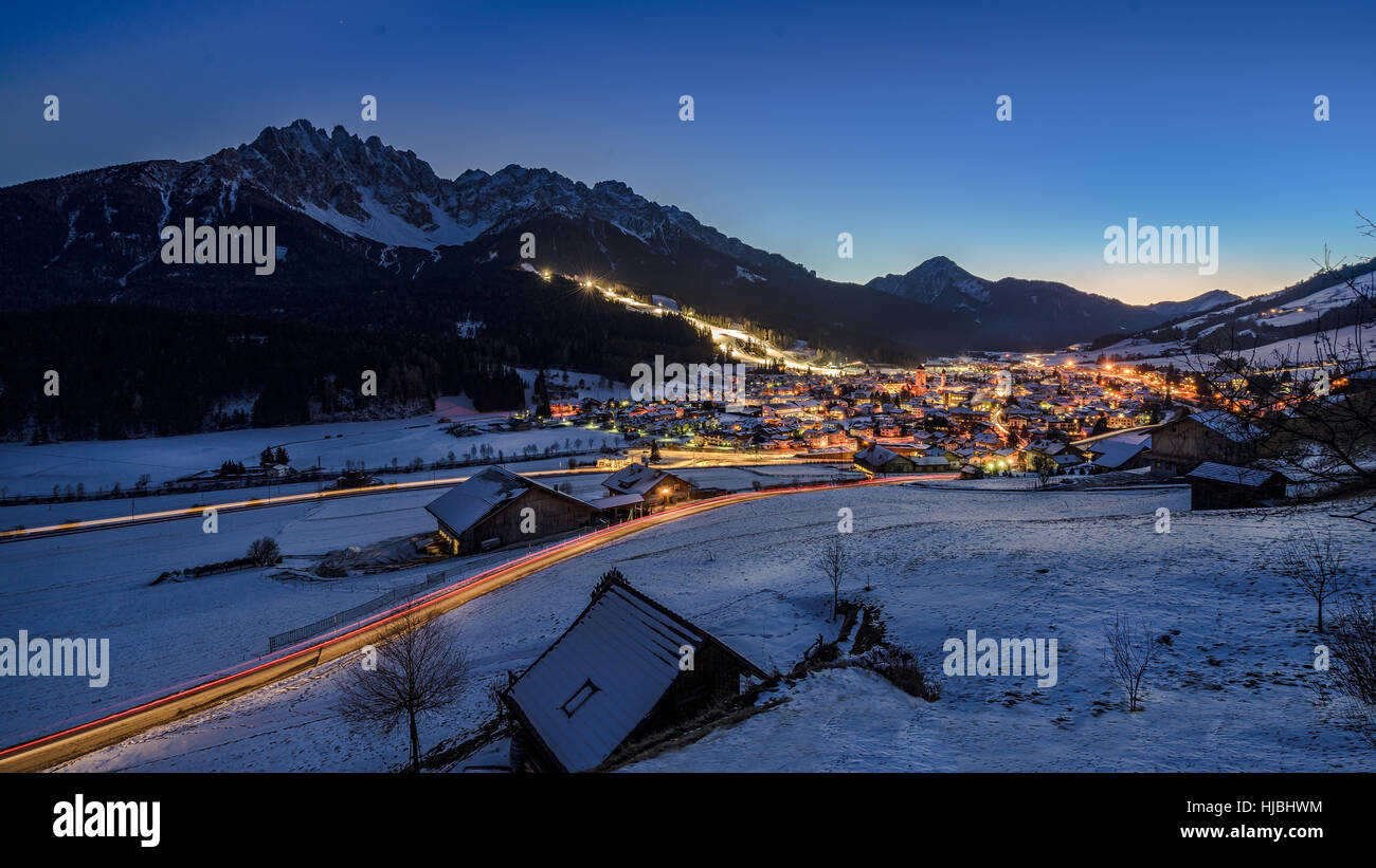 San Candido / Innichen at dusk in winter in the Italian Dolomites, Südtirol, Alto Adige, South Tyrol - Italy Stock Photo