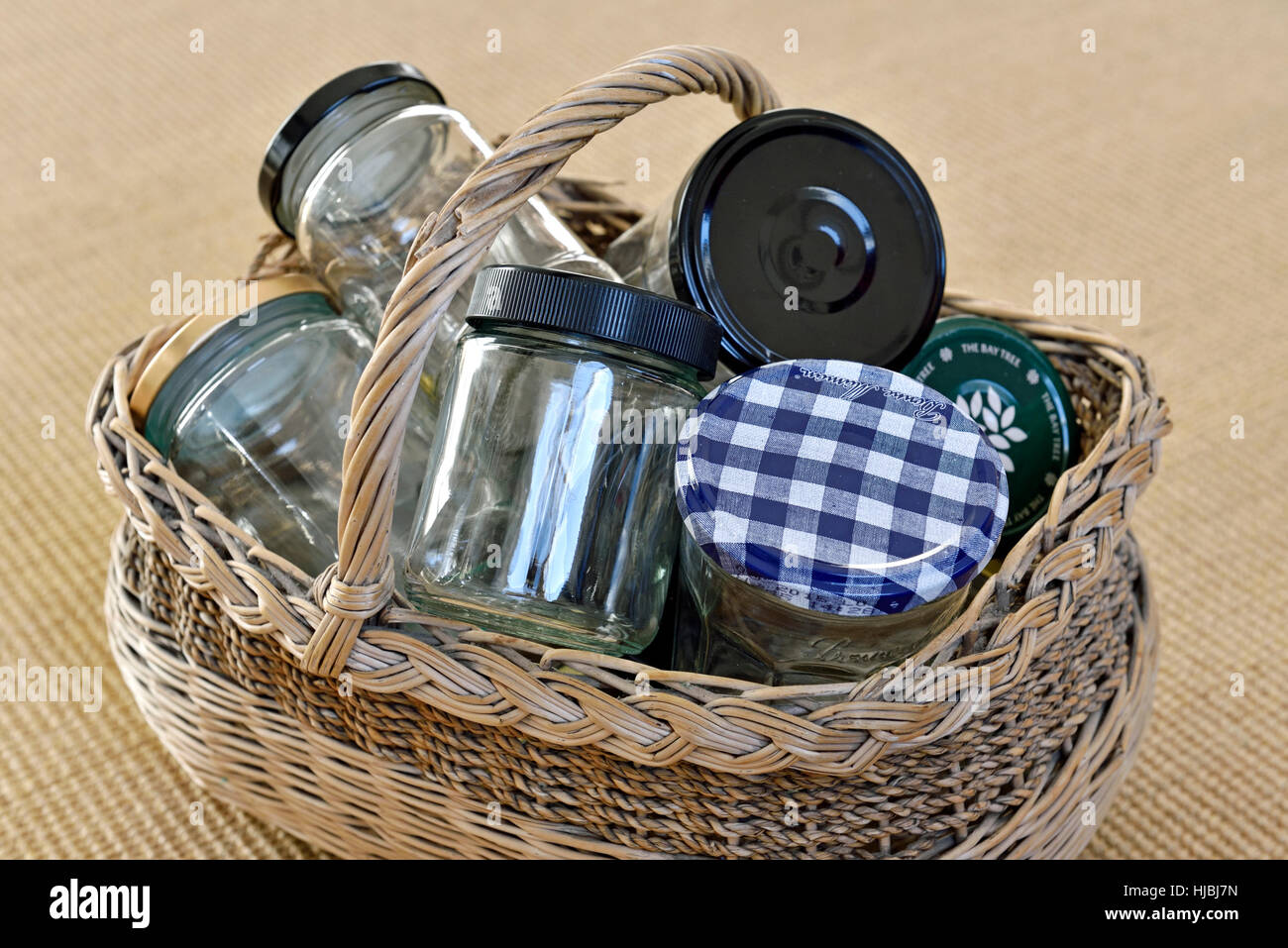 Clean glass jars for reuse in jam making or recycling, in vintage