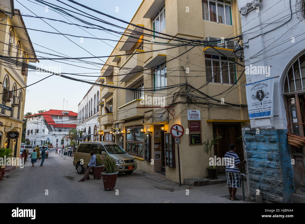Stone Town, Zanzibar, Tanzania - October 2016: Electric power transfer wires are mixed with water plumbing. Safety is underestimated in Zanzibar. Fred Stock Photo