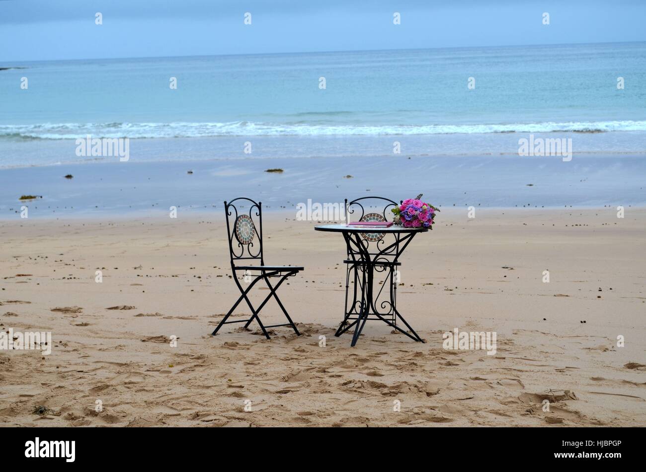 Table with chairs on the beach hires stock photography and images Alamy