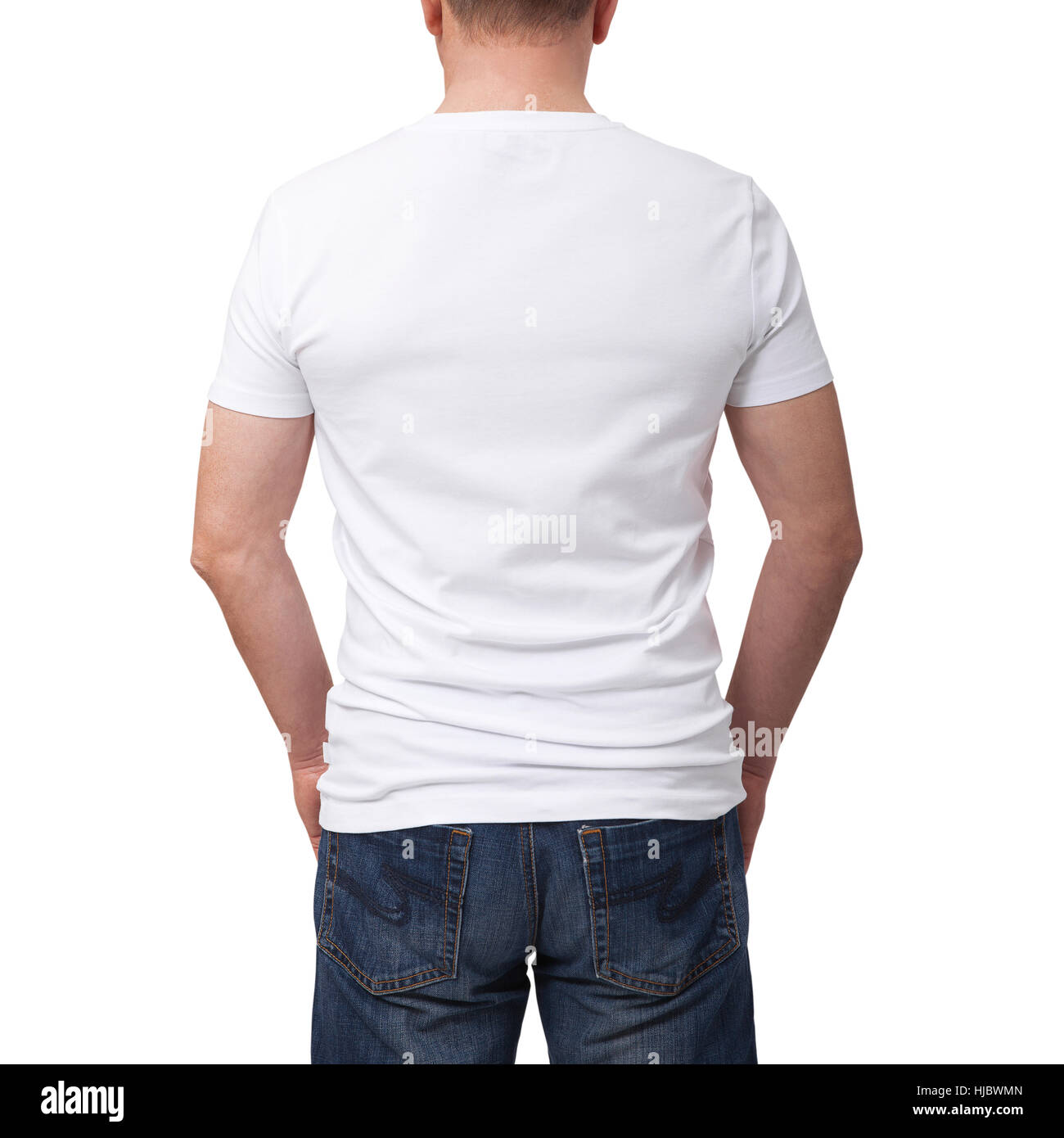 Man wearing blank t-shirt on gray brick wall background with copy space. Tshirt design and people concept - close up of man in blank white t-shirt. Back view Stock Photo
