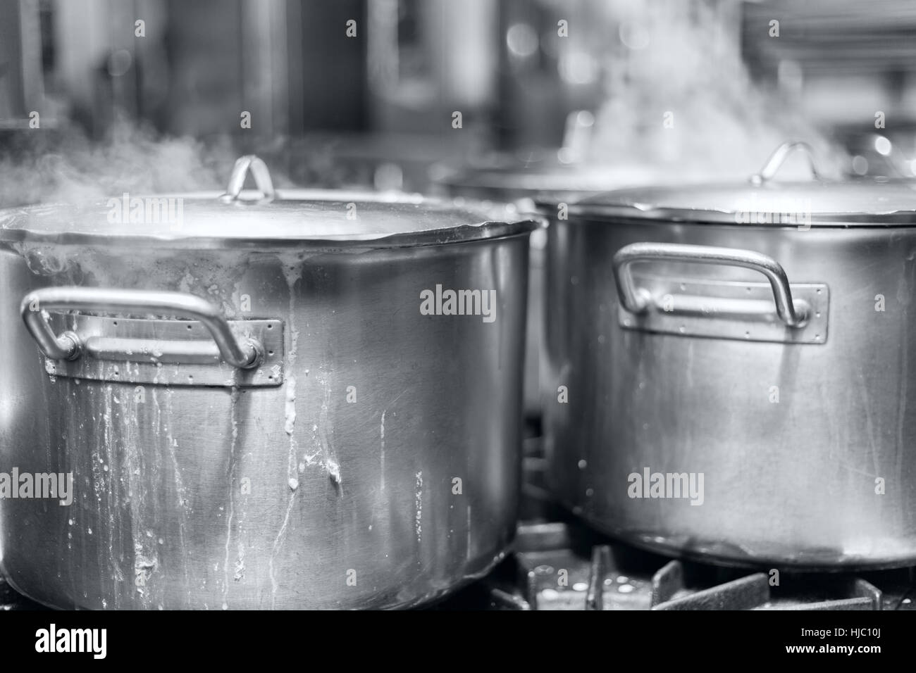 https://c8.alamy.com/comp/HJC10J/the-big-pot-of-boiling-soup-black-and-white-stock-photo-HJC10J.jpg
