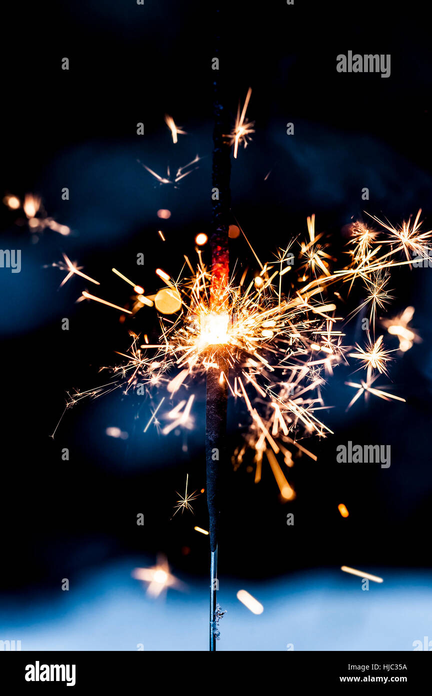 Sparkling fire stick with particles Stock Photo Alamy