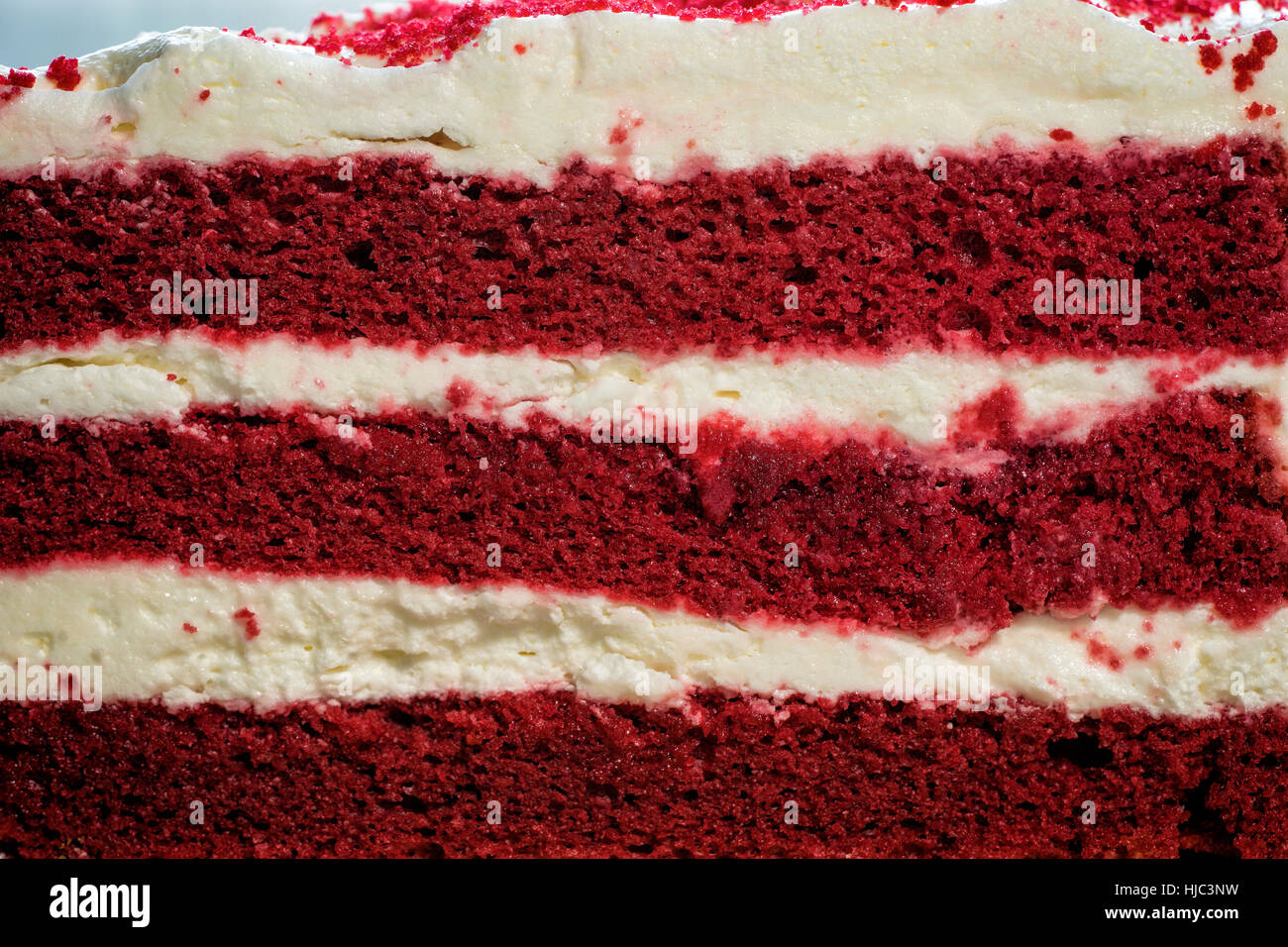 face cut of red velvel cake on macro image - can use to display or montage on product Stock Photo
