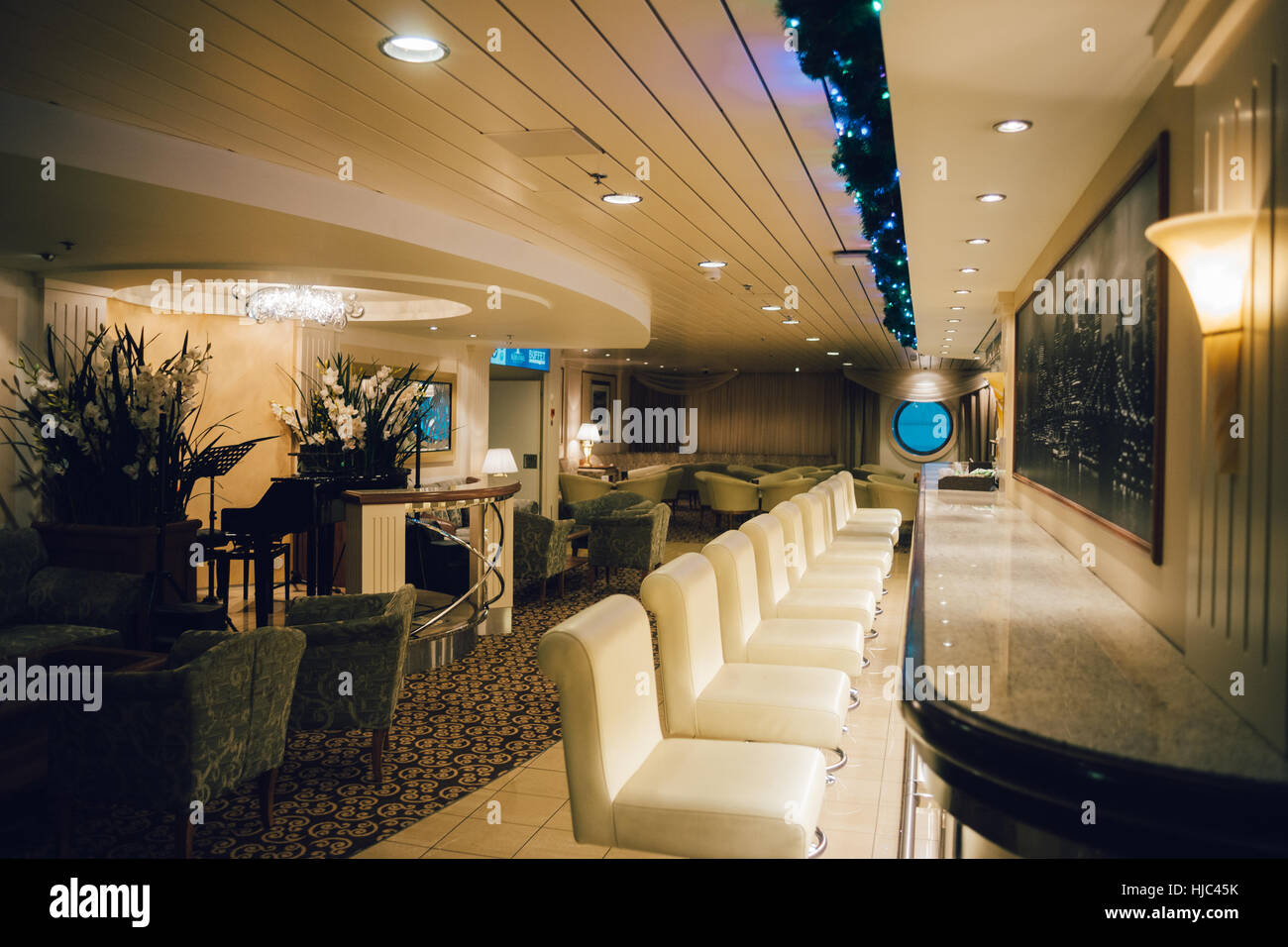STOCKHOLM, SWEDEN - JAN 12, 2017: Interior of the piano bar Manhattan at the Baltic Queen cruise ferry operated by Tallink, one of the largest shippin Stock Photo