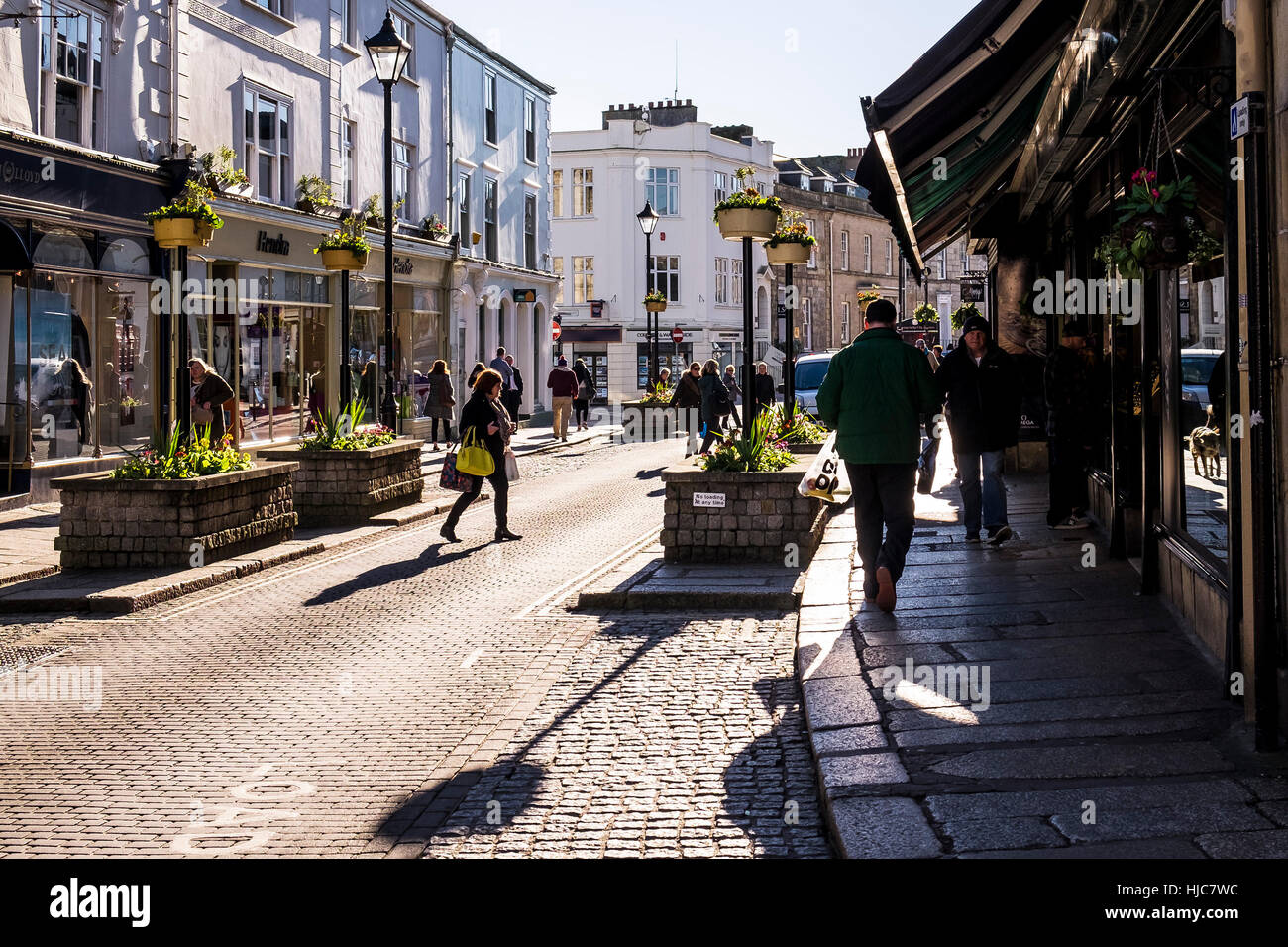 A street in Truro city centre bathed in early morning light.  Cornwall, England. Stock Photo