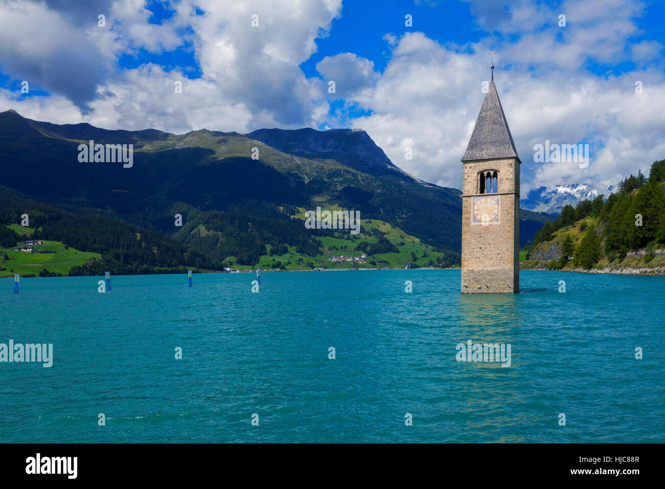 Submerged Curon church bell tower in lake, Vinschgau Valley, South Tyrol, Italy Stock Photo