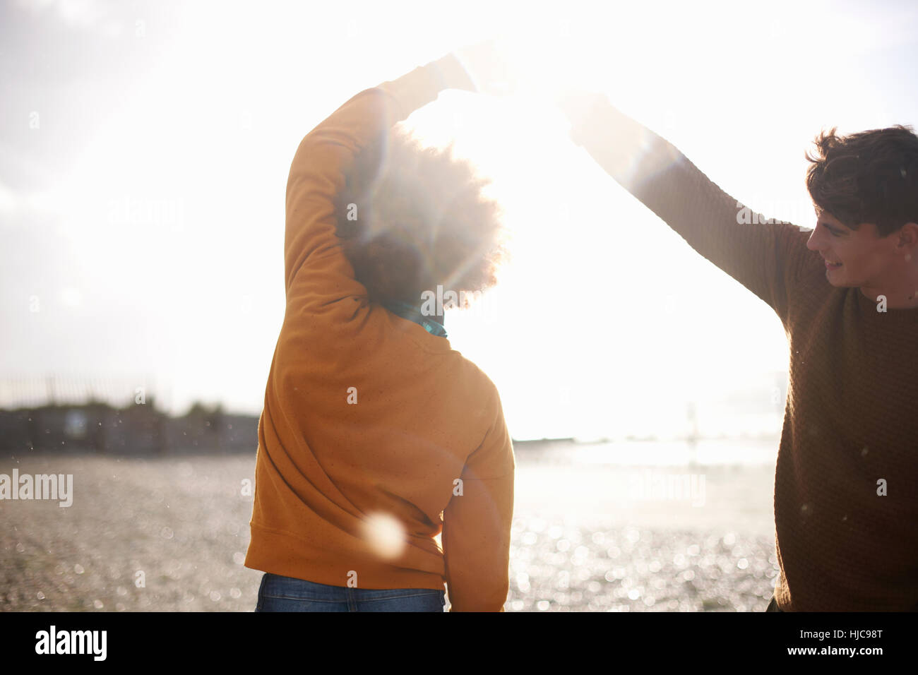Couple dancing on beach Stock Photo - Alamy