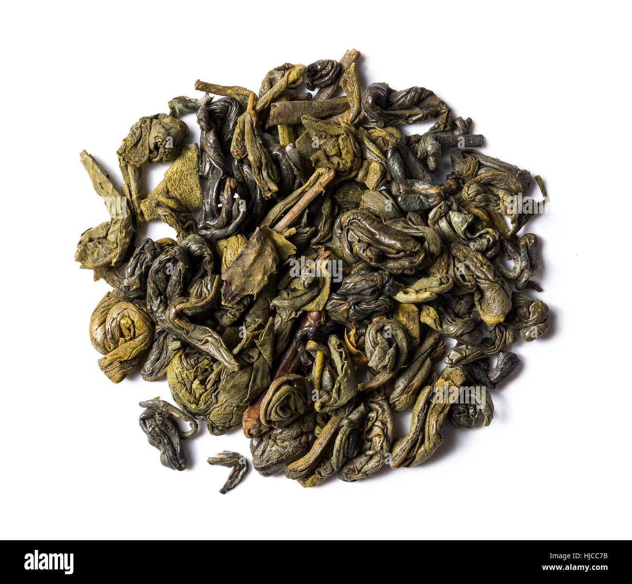 Heap of dried leaves green tea chinese gunpowder isolated on white background, view from above. Stock Photo