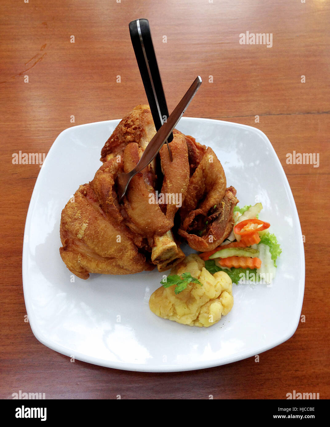 German Pork Hocks Deep fried pork knuckle served with mashed potatoes