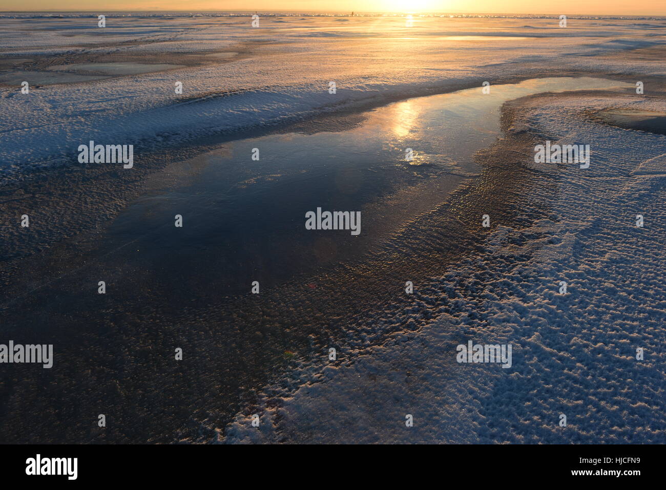 Ice desert at sunset winter sun natural beauty Stock Photo
