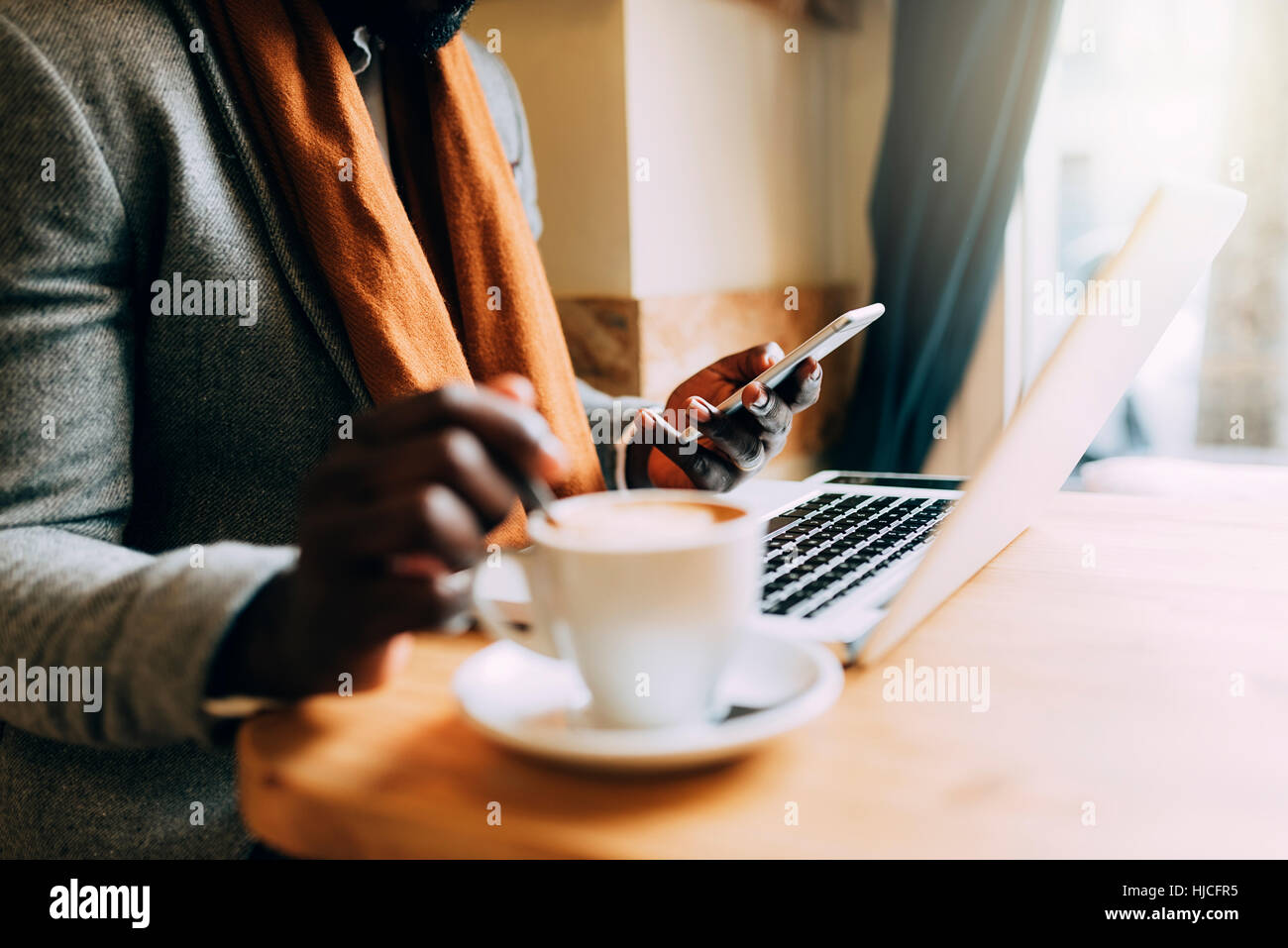 Businessman using his laptop in the Coffee Shop. Business Concept Stock Photo