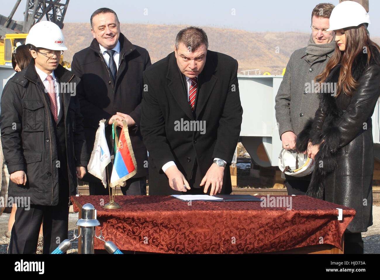 Drmno, Serbia. 23rd Jan, 2017. Acting general director of the Electric Power Industry of Serbia (EPS) Milorad Grcic signs the decision to begin works on installing equipment at the Drmno coal mine in Drmno, Serbia. China Engineering Machinery Corporation (CMEC) recently began assembling modern mining equipment at the mine in order to increase its production for the EPS in a project worth 123 million U.S. dollars. Credit: Nemanja Cabric/Xinhua/Alamy Live News Stock Photo