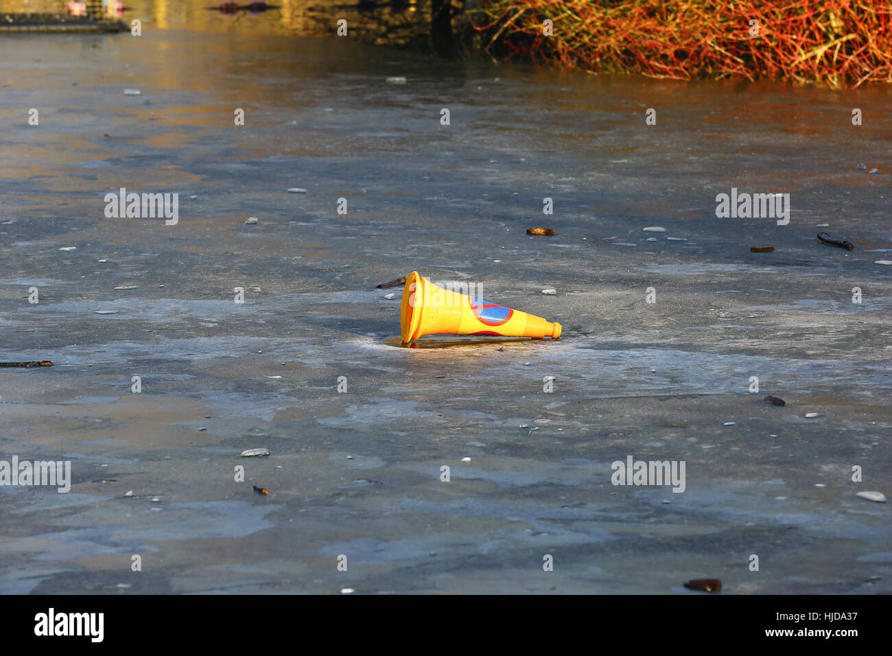 Alexandra Palace, North London, UK. 24th Jan, 2017. Traffic Cone on a frozen lake at Alexandra Palace, North London, following another night of freezing temperatures. Credit: Dinendra Haria/Alamy Live News Stock Photo