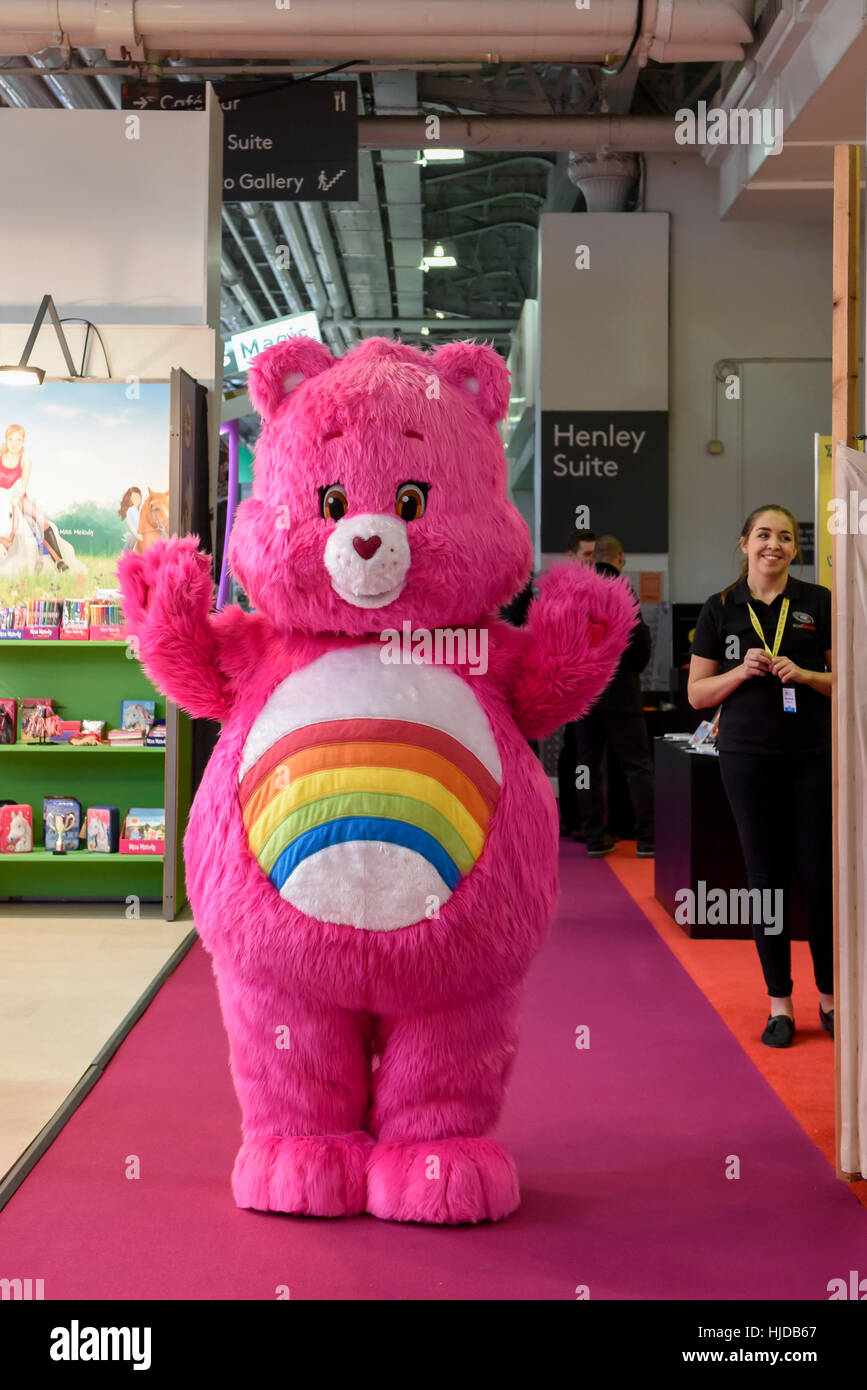 London, UK. 24th Jan, 2017. A costumed Care Bear is seen at the opening day of the Toy Fair 2017, taking place at Kensington Olympia. The trade show brings together many of the leading toy manufacturers and distributors and offers a chance for buyers to see the latest toys in preparation for Christmas. Credit: Stephen Chung/Alamy Live News Stock Photo