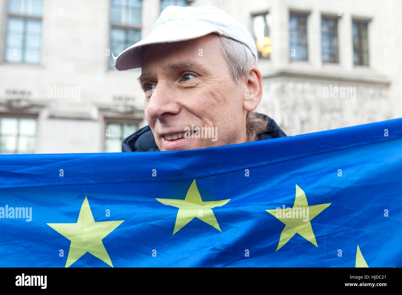 London, UK. 24th Jan, 2017. Verdict of the Supreme Court. The verdict of the Supreme Court was given today. A happy supporter of the Remain campaign with his flag. Credit: Jane Campbell/Alamy Live News Stock Photo