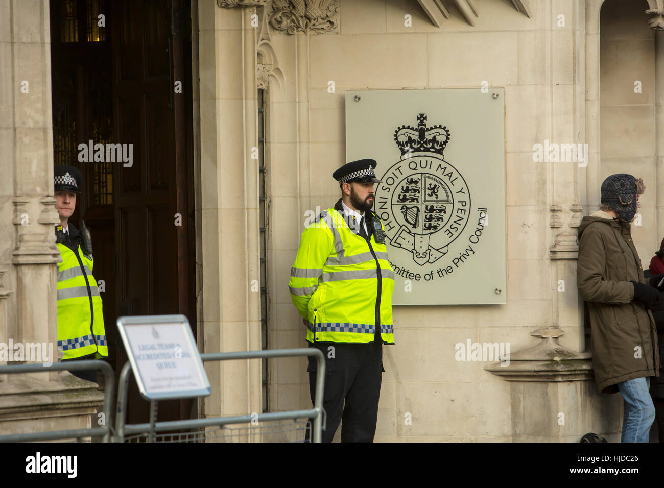 London, UK. 24th Jan, 2017. Verdict of the Supreme Court. The verdict of the Supreme Court was given today. A policeman guards the entrance to the court with its famous symbol. Credit: Jane Campbell/Alamy Live News Stock Photo