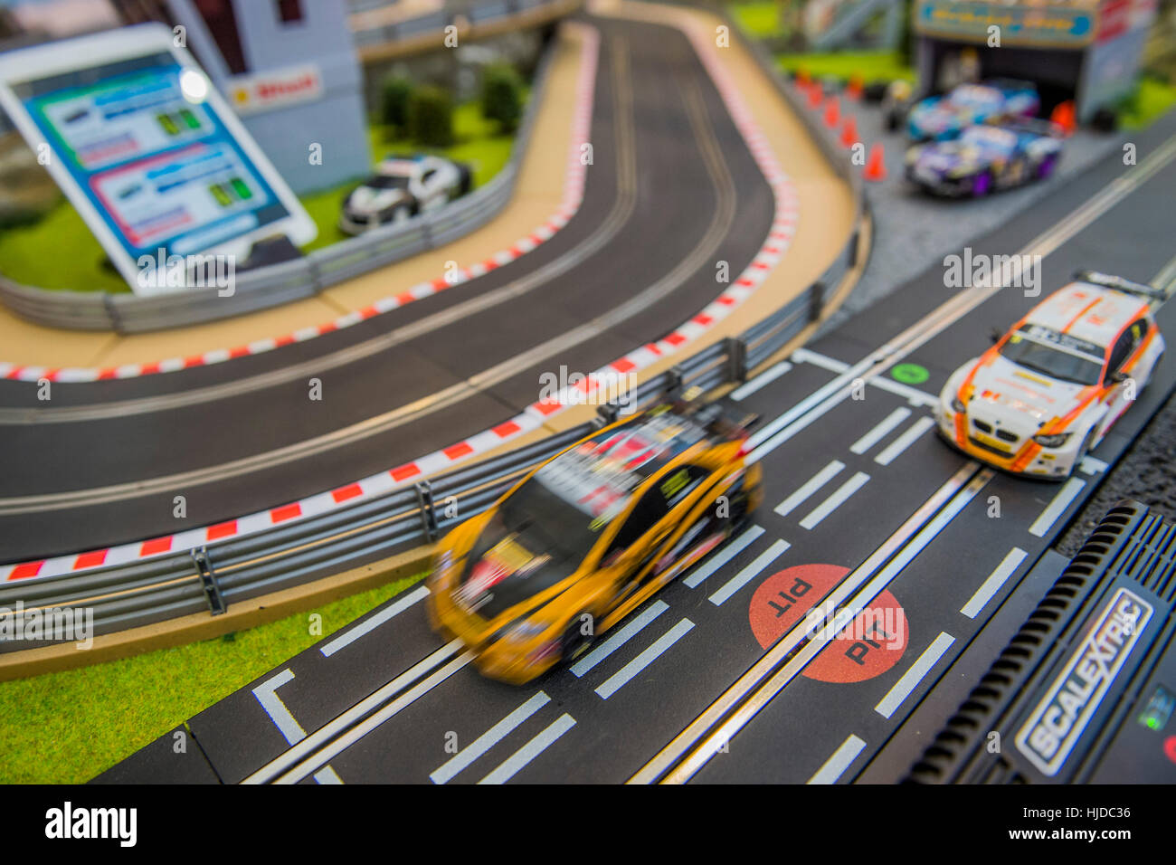 London, UK. 24th Jan, 2017. Tablet app controller and Scalextrics set on the Hornby stand - The London Toy Fair opens at Olympia exhibition centre. Organised by the British Toy and Hobby Association it is the only dedicated toy, game and hobby trade exhibition in the UK. It runs for three days, with more than 240 exhibiting companies ranging from the large internationals to the new start up companies. London 24/01/17 Credit: Guy Bell/Alamy Live News Stock Photo