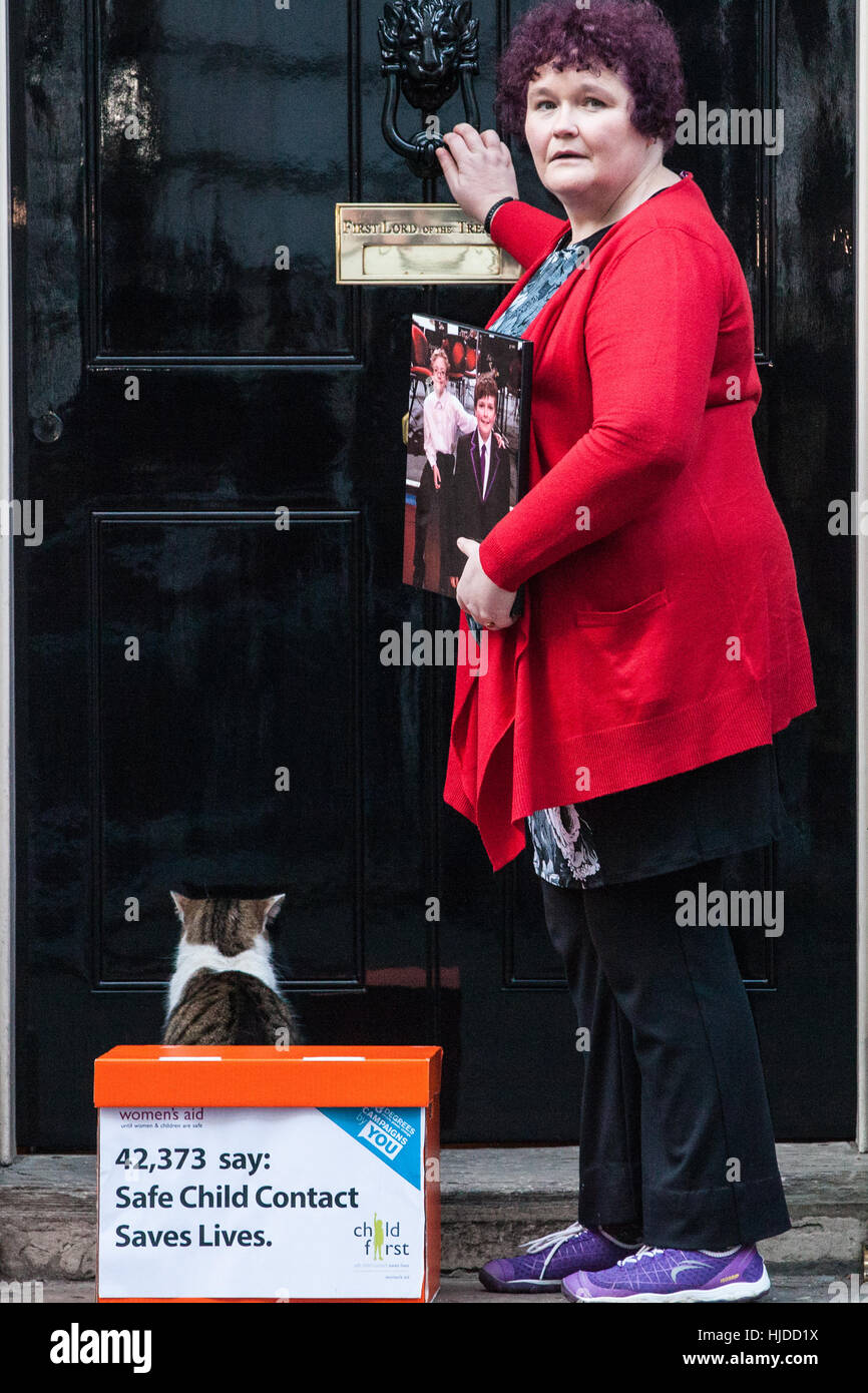 London, UK. 24th January, 2017. Claire Throssell, whose children were killed by her abusive ex-husband in 2014, presents a Child First petition signed by over 40,000 38 Degrees supporters at 10 Downing Street. Child First calls for an end to unsafe child contact with dangerous perpetrators of domestic violence through the family court process. Credit: Mark Kerrison/Alamy Live News Stock Photo