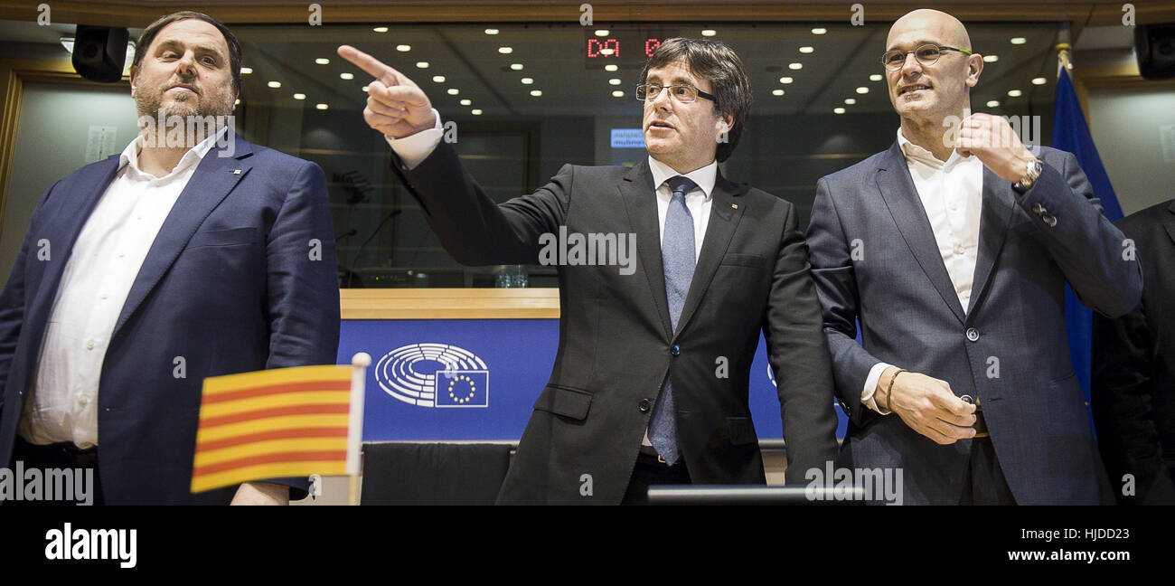 Oriol Janqueras Vice President of the Catalan government of Economy and Treasury (L), Carles Puigdemont President of the Catalan government (C) and Raul Romeva Catlan minister of Foreign Affairs and Transparency take part in the conference on The Catalan Independence Referendum at European Parliament headquarters in Brussels, Belgium on 24.01.2017 by Wiktor Dabkowski | usage worldwide Stock Photo