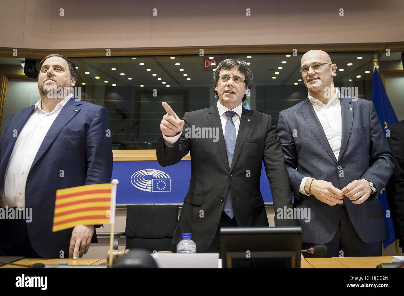 Oriol Janqueras Vice President of the Catalan government of Economy and Treasury (L), Carles Puigdemont President of the Catalan government (C) and Raul Romeva Catlan minister of Foreign Affairs and Transparency take part in the conference on The Catalan Independence Referendum at European Parliament headquarters in Brussels, Belgium on 24.01.2017 by Wiktor Dabkowski | usage worldwide Stock Photo