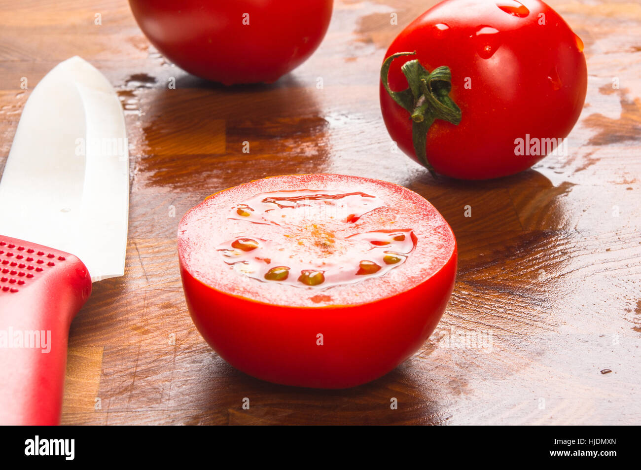 still life - ripe small tomatoes on wooden background Stock Photo