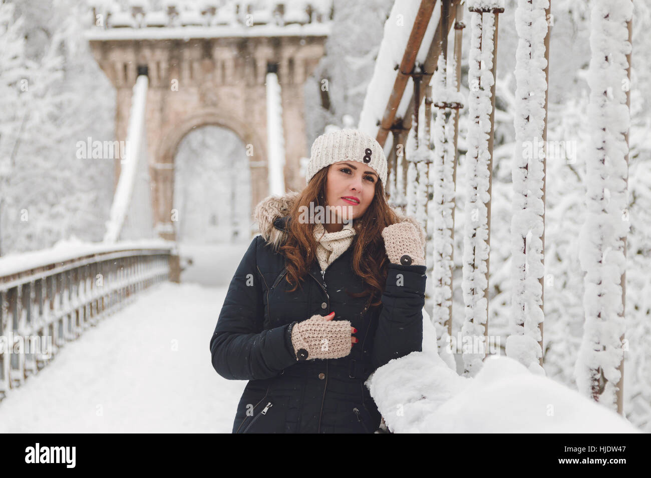 Winter portrait of a beautiful woman in the snowfall Stock Photo - Alamy