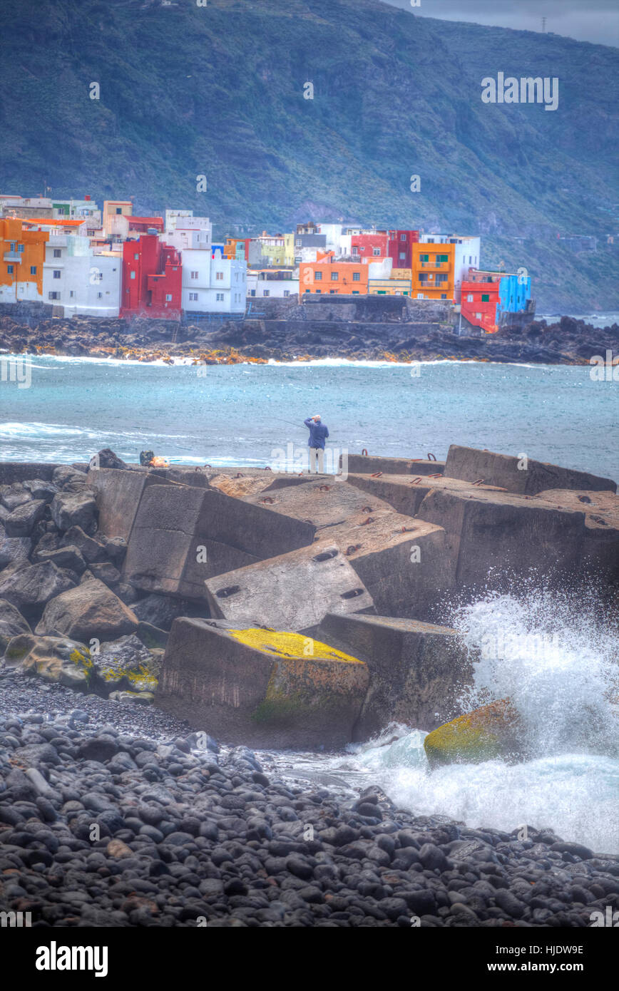 Puerto de la Cruz. fisherman standing